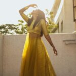 Deepika Venkatachalam Instagram – An outfit like sunshine 💛  ft @athiradesigns 

On somedays you just wear an outfit and all you want to do is to twirl twirl and twirl!! 🥹
One such outfit is this semi banaras crop top and skirt set from (@athiradesigns) 

A super cute crop top with attached sheer net and a flowy skirt with lots of flare. I still can’t decide what’s my favorite part about the dress, coz I just love everything about this dress and how it fits perfectly.
And the colour!! Aahh!! Gives you a royal look instantly and make heads turn in the crowd. I don’t own many outfits in this colour, so the moment I saw the dress, I knew I want it in my wardrobe.

It’s a great option to wear it for haldi, mehandi, sangeeth, birthday parties, family functions, oh come on, for what not!! You can be ready in a minute and slay anywhere!❤️

To elevate the trendiness of the look, we decided to go for a kutty jumkha and bangles. And when I looked at the mirror, I felt like a princess🙈 So I decided to go to the terrace during the golden hour to twirl my heart out and take some beautiful pictures with our team. 
I love how the pictures turned out, and it easily became one my fav set of pictures till date. What do you guys think? 💭
.
.
📸 @keshu_hariharan @thatmadraskaran 
.
#deepika #reelit