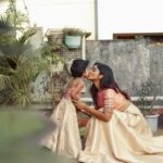 Deepika Venkatachalam Instagram - When this chithi was so adamant to twin with her little angel Popsie for her life’s happiest event 🥺♥️ Yeah, by now all of you must know I twinned with Popsie for my engagement and it was the first decision I made after picking a date for the event. When my stylist @artra_styling was scouting for fabrics to design my engagement skirt, she also made sure extra fabric was purchased to make a similar skirt for Popsie!! The idea by itself was cute to imagine two similar skirts in extreme sizes 🥺♥️ My skirt went through a lot of iterations between my stylist and the designer while I handed over Popsie’s outfit to our Malar Akka @fiorebymalar_ and asked her to make something tiny and cute so Popsie would look like my little version! That was it. A day before the engagement we received Popsie’s dress and it was too beautiful to describe!! ❤️ It’s made from Pure Benarasi Silk paired with a halter neck top from a pure silk brocade fabric that has hand embroidered kundan work & zardosi detailing with a lovely knot at the back which was already looking way too cute! For a second that day, I wanted to be Popsie to just twirl around in that outfit and enjoy myself! It was that beautiful and adorable to see! Meanwhile when we decided to shoot at a later date I found my engagement saree blouse ( customised by @d.sign.d ) matching more perfectly with Popsie’s outfit hence wore that and straight away took her to our terrace to shoot these close to pictures that will forever remain in my memory and heart!!! Just like how our skirts are twinning, I wish one day we think alike too! 🥺😍 Cheers to us for creating more and more memories when life offers us some precious moments!! Ohhh yeah! Btw These skirts are called Panelled skirts because they are panelled in a way that will let you twirl through so beautifully along with your lil one. If you’re thinking of getting done, ask your designer to stitch matching matching panelled skirts!!! Eeee. . #Deepika #Popsie #Niece #Chithi