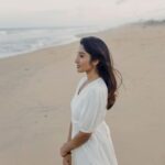 Deepika Venkatachalam Instagram - That was a calm morning by the beach 🏖️ 🤍 Ah! I have been missed doing this for months now and this time when the climate was breezy and windy, I took off to hit the beach nearest to my place wearing the recent favourite beige outfit. A beautiful morning just got extra wonderful by this comfortably rich piece of outfit that is definitely a staple investment and more of my Sunday's are going to witness this dress over and again! What I loved about the morning and the dress was it was just soo cozy and made want to stay more! 🤍 Just a simple piece of outfit with flares at the bottom, a tiny slit in between, a knot at the back and those cutest sleeves could bring in soo much joy, warmth and happiness in me!!! Thanks to @theputchi 🤍 for making such subtle piece of clothes that can define and amp up one's day and heart! . 📸 @thatmadraskaran . #deepika #chennaiblogger #chennaiinfluencer #styling