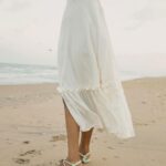 Deepika Venkatachalam Instagram - That was a calm morning by the beach 🏖️ 🤍 Ah! I have been missed doing this for months now and this time when the climate was breezy and windy, I took off to hit the beach nearest to my place wearing the recent favourite beige outfit. A beautiful morning just got extra wonderful by this comfortably rich piece of outfit that is definitely a staple investment and more of my Sunday's are going to witness this dress over and again! What I loved about the morning and the dress was it was just soo cozy and made want to stay more! 🤍 Just a simple piece of outfit with flares at the bottom, a tiny slit in between, a knot at the back and those cutest sleeves could bring in soo much joy, warmth and happiness in me!!! Thanks to @theputchi 🤍 for making such subtle piece of clothes that can define and amp up one's day and heart! . 📸 @thatmadraskaran . #deepika #chennaiblogger #chennaiinfluencer #styling