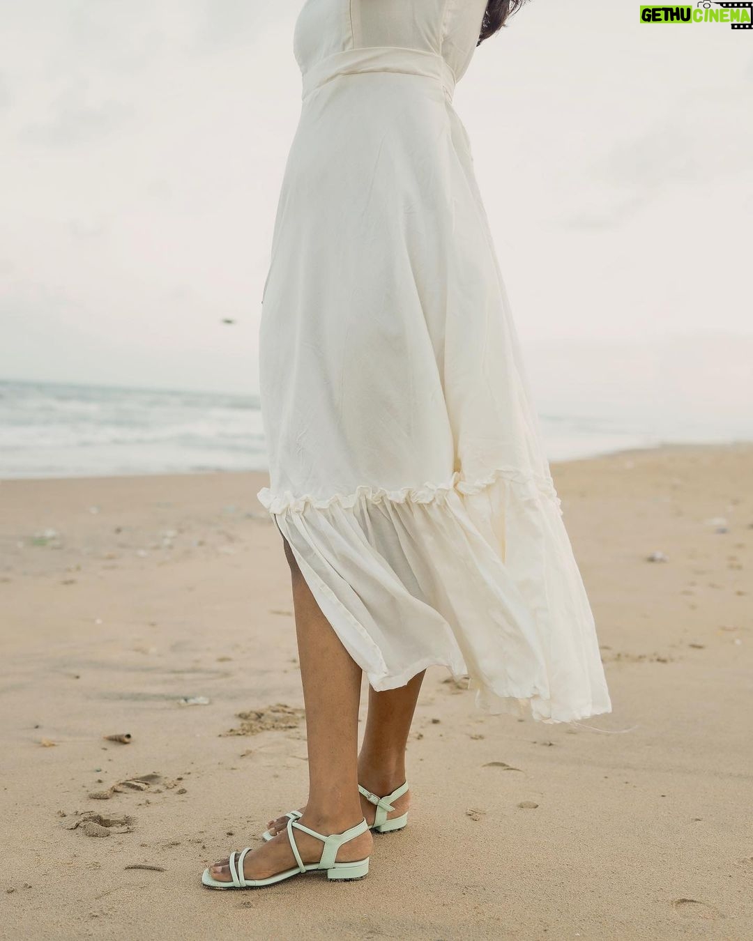 Deepika Venkatachalam Instagram - That was a calm morning by the beach ποΈ π€ Ah! I have been missed doing this for months now and this time when the climate was breezy and windy, I took off to hit the beach nearest to my place wearing the recent favourite beige outfit. A beautiful morning just got extra wonderful by this comfortably rich piece of outfit that is definitely a staple investment and more of my Sunday's are going to witness this dress over and again! What I loved about the morning and the dress was it was just soo cozy and made want to stay more! π€ Just a simple piece of outfit with flares at the bottom, a tiny slit in between, a knot at the back and those cutest sleeves could bring in soo much joy, warmth and happiness in me!!! Thanks to @theputchi π€ for making such subtle piece of clothes that can define and amp up one's day and heart! . πΈ @thatmadraskaran . #deepika #chennaiblogger #chennaiinfluencer #styling