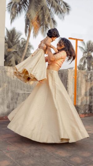 Deepika Venkatachalam Instagram - Chithi & Daughter - An unending tale of Love and Laughter 🥺♥️
.
.
During my engagement preparations, I was so keen to twin with Popsie for the big day  and took so many pinterest reference images to click images with her but in reality nothing actually worked as Madam was way tired,sleepy and almost cranky 😅 after every event but this chithi’s heart couldn’t let it go and somehow wanted to do a shoot with her in all her outfits so it’ll be a memory for both of us forever. 🥹
 
I somehow figured out a casual day when she was in her best mood and shot some interesting pictures with her on our Motta Maadi (the same place where Popsie and I have played and had immense fun). 

While I actually wanted to post these images long ago it somehow skipped my mind and now it seems like these pictures were waiting for a soulful song like this that so beautifully describes our bond!! 🥺♥️

Did the song wait for our pictures or did we wait for a song like this? 😌 “ Namakkuney elundha paatu maadri irukku la popsie ? “

And Popsie’s lovely outfit and my gorgeous skirt that was custom made to twin with eachother 😍 by none other than my forever @fiorebymalar_ ❤️

Just the way Popsie says “Niceeee” these pictures and this song are absolutely nice and stole my heart in every single way!! 🥺

Popsie, may not be my biological daughter but she’s the most treasured piece of my heart and I see her and value her like my own and there’s not a single day that goes by without missing her giggles in our home when she’s away from us! 
When 2020 was bad for everyone, her mom delivered this tiny little angel and brought her home to brighten our lives in the best way, ever. 🧿 
.
🎥 & 📷 : @keshu_hariharan 
& @mukesh__dm 

#Deepika #Popsie #Chithi #niece