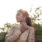 Deepika Venkatachalam Instagram - #Weddinglookbook Rajasthani themed Sangeeth (1/3) 🫶🏼✨ We knew sangeeth would be full of fun and laughter with our close friends & family hence theme was set to Rajasthani for their vibe and joy. From the moment the theme was chosen, the quest for the perfect outfit began for me and Raja, because we were so excited for the Sangeeth to be precise. We wanted an outfit that spoke bling, sophistication and elegance. Our talented stylist @stylingbysamiha created a mood board with neutral shades and a sequin combination. The colours beige, brown and peach were shortlisted and finally, we chose the colour beige because that went well for both of our skin tones. And to add the bling, Samiha suggested going for sequins and net fabric. That was it. Colour and fabrics were fixed. Woooh 😁🔥 When we were looking for a lot of designers @mayon_by_subhathracouture came across and we loved their works. From the moment we stepped into their store to the moment our outfits were delivered, they listened to every need and made sure we got what we wanted. The team gave us a lot of design options to choose and customize from and when the final design was shown, I fell in love instantly. Imagine a doll-like sequin-layered net gown - the top half adorned with glittering sequins that shine like stars, while the flattering netted bottom with twirl-worthy flares that add a touch of magic to every spin. Who will not fall in love with this beauty la?🙈 😍 A bling outfit without perfect accessories is a No right?! Samiha chose a super cute and simple white stoned choker set from @fineshinejewels with a small earring and a ring. It added more elegance to the outfit and at the same time didn't steal the attention from the outfits as well. And on the day, when I was completely ready I felt like a Barbie doll myself ready to dance my heart out and have fun at our Sangeeth. 🙈 So what does my #instafam think? Do I look like a bling Indian barbie doll?😌 . 📸 @sakshi.ramakrishnan Decor @vizhamedai Makeup and hair : @snehamnj . #RnD #RnDwedding