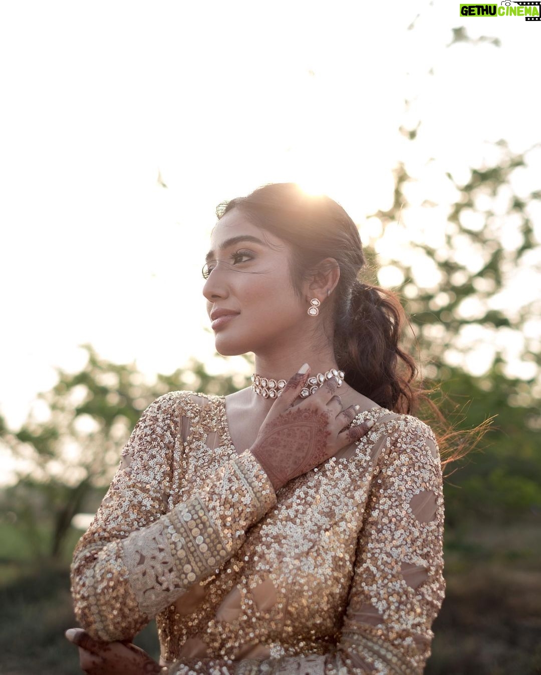 Deepika Venkatachalam Instagram - #Weddinglookbook Rajasthani themed Sangeeth (1/3) π«ΆπΌβ¨ We knew sangeeth would be full of fun and laughter with our close friends & family hence theme was set to Rajasthani for their vibe and joy. From the moment the theme was chosen, the quest for the perfect outfit began for me and Raja, because we were so excited for the Sangeeth to be precise. We wanted an outfit that spoke bling, sophistication and elegance. Our talented stylist @stylingbysamiha created a mood board with neutral shades and a sequin combination. The colours beige, brown and peach were shortlisted and finally, we chose the colour beige because that went well for both of our skin tones. And to add the bling, Samiha suggested going for sequins and net fabric. That was it. Colour and fabrics were fixed. Woooh ππ₯ When we were looking for a lot of designers @mayon_by_subhathracouture came across and we loved their works. From the moment we stepped into their store to the moment our outfits were delivered, they listened to every need and made sure we got what we wanted. The team gave us a lot of design options to choose and customize from and when the final design was shown, I fell in love instantly. Imagine a doll-like sequin-layered net gown - the top half adorned with glittering sequins that shine like stars, while the flattering netted bottom with twirl-worthy flares that add a touch of magic to every spin. Who will not fall in love with this beauty la?π π A bling outfit without perfect accessories is a No right?! Samiha chose a super cute and simple white stoned choker set from @fineshinejewels with a small earring and a ring. It added more elegance to the outfit and at the same time didn't steal the attention from the outfits as well. And on the day, when I was completely ready I felt like a Barbie doll myself ready to dance my heart out and have fun at our Sangeeth. π So what does my #instafam think? Do I look like a bling Indian barbie doll?π . πΈ @sakshi.ramakrishnan Decor @vizhamedai Makeup and hair : @snehamnj . #RnD #RnDwedding