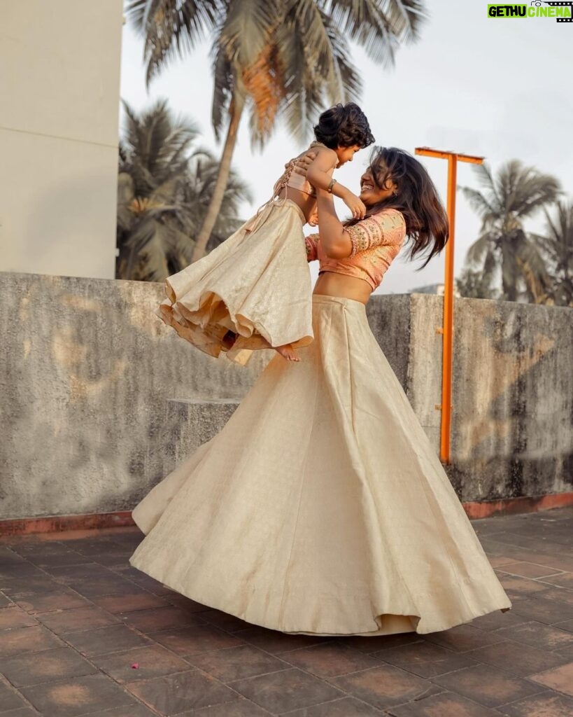 Deepika Venkatachalam Instagram - When this chithi was so adamant to twin with her little angel Popsie for her life’s happiest event 🥺♥️ Yeah, by now all of you must know I twinned with Popsie for my engagement and it was the first decision I made after picking a date for the event. When my stylist @artra_styling was scouting for fabrics to design my engagement skirt, she also made sure extra fabric was purchased to make a similar skirt for Popsie!! The idea by itself was cute to imagine two similar skirts in extreme sizes 🥺♥️ My skirt went through a lot of iterations between my stylist and the designer while I handed over Popsie’s outfit to our Malar Akka @fiorebymalar_ and asked her to make something tiny and cute so Popsie would look like my little version! That was it. A day before the engagement we received Popsie’s dress and it was too beautiful to describe!! ❤️ It’s made from Pure Benarasi Silk paired with a halter neck top from a pure silk brocade fabric that has hand embroidered kundan work & zardosi detailing with a lovely knot at the back which was already looking way too cute! For a second that day, I wanted to be Popsie to just twirl around in that outfit and enjoy myself! It was that beautiful and adorable to see! Meanwhile when we decided to shoot at a later date I found my engagement saree blouse ( customised by @d.sign.d ) matching more perfectly with Popsie’s outfit hence wore that and straight away took her to our terrace to shoot these close to pictures that will forever remain in my memory and heart!!! Just like how our skirts are twinning, I wish one day we think alike too! 🥺😍 Cheers to us for creating more and more memories when life offers us some precious moments!! Ohhh yeah! Btw These skirts are called Panelled skirts because they are panelled in a way that will let you twirl through so beautifully along with your lil one. If you’re thinking of getting done, ask your designer to stitch matching matching panelled skirts!!! Eeee. . #Deepika #Popsie #Niece #Chithi