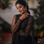 Deepika Venkatachalam Instagram – Black Saree – A Timeless Classic🖤 ft @bespoke.dhishya ✨

The moment I came to know that we were nominated for the She Awards, I knew I should look great on the day, no matter if we won the black lady or not. The first person I called was Pavi @artra_styling , (she was the one who did our engagement styling) and when I told her about the award nominations she was more excited than us and was in full swing to make me look my best on our big day. 

Pavi suggested a black saree look to keep the simple and ethnic girl-next-door vibe ON and to match the aesthetic of the award- the black lady. We were searching for a lot of options and the one look that grabbed our attention in an instant and made us head over heels in love was this black sequin saree from  @bespoke.dhishya 🖤 It looked perfect for an award show and I’m sure I’d restyle it for my cousin’s or friend’s reception too. ( Receptions and Black! Hehe. 🙈 iykyk) For the blouse we decided to go classic with full sleeves and a boat neck and team @d.sign.d were sweet enough to do it in the last minute for us with full embroidery and perfectly delivered it in no time. 101 reasons why I go back to them, again and again ✅

To keep the attention on the saree, Pavi suggested only a white stoned flower motif designed ring and earring from @aaranyarentaljewellery and it was just perfect! 💎

We wanted to keep the makeup & hairdo minimum and @athmika_makeupstories  gave a subtle look just like how I wanted and @priyaprabu_artistry did a super cute ponytail that elevated the whole look beautifully. When I stepped out of my room all dolled up, Amma was so stunned looking at me and loved the whole look. Enna thaan veliya 1000 peru sonnalum, Amma solra “Azhagaa irukaa dii” is always special laa?🥹

We quickaahh went to the terrace and clicked some beautiful pictures before we went to the event. And that night we were back home with the Black Lady on our hands. Always grateful for that night and the love I received 🖤

But now looking at the pictures makes me think this would be a classy look for a Diwali evening party. 🔥 #DiwaliwithD (8/10) What say guys?🌝
.
📸 @mukesh__dm 
.
#deepika #diwaliwithD #chennaiinfluencer