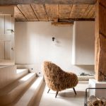 Diipa Khosla Instagram - Revealing one of my favourites rooms - The “atelier”, beautifully coined by our incredible architect @gabriela.puig.soleille whose vision was to create a world of zen and tranquility for our subterranean haven. Why I love it so much? The arched ceilings, the elegant materials, and the magic of invisible doors make this space truly one-of-a-kind. Project realised by “Gabriela Soleille Studio“ @Gabriela.puig.soleille Architect collaborator: Carole Martinod @carole.inraw Creative Director: Mirko Musmeci @mirko.musmeci Door Veneer: Alpi @alpi_wood in Day & Night Twill Door Fixtures & Handles: Formani @formani_doorware From the EV series in satin gold Wall Paint: Detale @detalecph in KC14 Microcement: La Nena @lanenahome Lights: Viabizzuno @viabizzunoprrogettiamolaluce Spotlights: M1 Micro Scomparsa Totale & Microtraccia Micromen Atelier: PP P1 Parete, NP N55 Parete Con Braccio Antiques & Chandigarh Chairs: Mayur Arts @mayurartsindia, Antique Statues Vintage Furniture: Atelier Uma @atelieruma Photographed by @ankeleunissenphotography