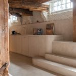 Diipa Khosla Instagram - Revealing one of my favourites rooms - The “atelier”, beautifully coined by our incredible architect @gabriela.puig.soleille whose vision was to create a world of zen and tranquility for our subterranean haven. Why I love it so much? The arched ceilings, the elegant materials, and the magic of invisible doors make this space truly one-of-a-kind. Project realised by “Gabriela Soleille Studio“ @Gabriela.puig.soleille Architect collaborator: Carole Martinod @carole.inraw Creative Director: Mirko Musmeci @mirko.musmeci Door Veneer: Alpi @alpi_wood in Day & Night Twill Door Fixtures & Handles: Formani @formani_doorware From the EV series in satin gold Wall Paint: Detale @detalecph in KC14 Microcement: La Nena @lanenahome Lights: Viabizzuno @viabizzunoprrogettiamolaluce Spotlights: M1 Micro Scomparsa Totale & Microtraccia Micromen Atelier: PP P1 Parete, NP N55 Parete Con Braccio Antiques & Chandigarh Chairs: Mayur Arts @mayurartsindia, Antique Statues Vintage Furniture: Atelier Uma @atelieruma Photographed by @ankeleunissenphotography