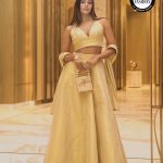 Dimpi Sanghvi Instagram - Be #FirstInFashion with Nykaa Fashion ✨ @gajra.gang is one of my recent finds on Nykaa Fashion! My favourite pick is this alluring lehenga choli. I have paired this with statement earrings, golden heels & a pearl stone bag - maintaining the same color theme to keep it elegant! Shop my look at @nykaafashion #NykaaFashion #FirstInFashion #DimpiSanghvi