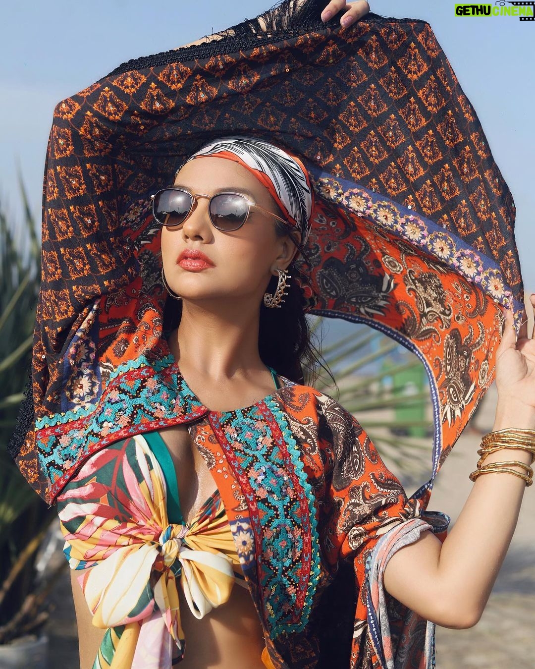 Divya Agarwal Instagram - I’m feeling so exotic . Cape @iamkenferns Cord set @erotissch_ Style by @stylingbyvictor @sohail__mughal___ Makeup @dishisanghvii Earrings @sianofficial_ Shades @opiumeyewear Footwear @tic_tac_toe_store Hair @fouzikazi_makeupndhair Clicked by @deepaksfilmography . . #divyaagarwal #vibecheck #tropical #fashiongram #workmode