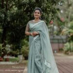 Gopika Anil Instagram - An organza kind of day ! 💚 This beautiful hand worked silk organza saree from my fav @jazaashdesignstudio 💚 💄 @abilashchickumakeupartist 📸 @vysakhvyga_official #ootd #outfitoftheday #organzasaree #loveforsaree #pastelshades #pictureoftheday #jazaashdesignstudio #photoshoot