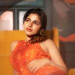 Iswarya Menon Instagram - Can’t think of a caption! 🤔 So why don’t you get creative and write one for me? 🧡😝 . 📷 @storiesbypreetham 📸 @labelnehagangolli @ramya_mua @preethinarayanan @saree_drapist_kalai_hairstyle @pepperfry