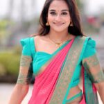 Kaavya Arivumani Instagram - This song and the red saree are irreplacable❤️😌 Muah:@jeevya_makeoverartistry ❤️beautifully draped thesaree and makeup 😌❤️ Favourite saree💙:@_sindhufashions_ Loving this series shot by :@prismatic_photography_7 Blouse enhanced this look ☺️:@askcouture.7 #kaavya#kaavyaarivumani