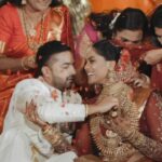 Karthika Nair Instagram - Embracing tradition, love, and timeless moments. Witness Karthika and Rohit’s magical bridal entry into forever. ✨👰🤵 #KarthikaRohitWedding #BridalEntryBliss #RoHitchedKat Venue: @udaypalace Photography: @nadorafilms Wedding Planner : @maritusweddings Decor & Design : @maritusweddings MUA: @vikas.vks.makeupartist | @abz_makeover Bridal Boutique : @fatiz_official | @noushifatiz @wedmegood @wedmegoodsouth @weddingvows.in @weddingsutra @bridesof_india @thebridesofindia @decorsutra @decordiyaa @dwp_congress #wedding #weddingphotography #weddingstyle #weddinginspiration #weddinginspo #weddingsaree #bridesofinstagram #bridesofindia #indianwedding #celebritywedding #karthikanair #keralawedding #weddingdecor #weddingvows #wedmegood #wedmegoodsouth #weddingsutra #explore #trending #reelsinstagram #reelitfeelit Uday Palace Convention Center