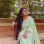 Kavitha Nair Instagram - In @rasaalistore after many moons 💚 Some shades wait for years to reach your body and soul, this is one of them.. :) #sareeaesthetics