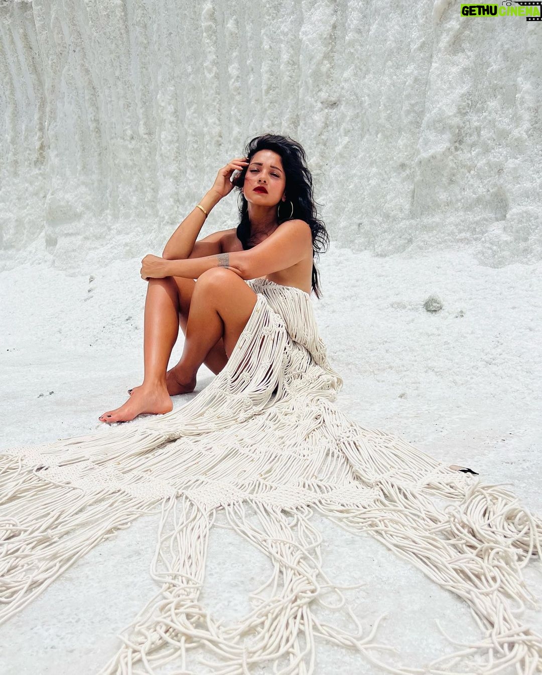 Megha Gupta Instagram - There is something strangely sacred about salt. Our sweat, tears, the sea, are all made up of salt. In the Bible, salt also came to symbolize purity, perfection, wisdom, hospitality, durability, and fidelity. I use salt for a physical and spiritual cleanse regularly. It repels evil spirits and absorbs any negative energy from a space. In this case, symbolises purification, protection, loyalty, and permanence. Salt is power. It might sound like alchemy, but the energy in places where salty ocean water and freshwater mingle could provide a massive source of renewable power. I recently discovered that I’m SALT (Single And Loving It), another version of “salt” these days 😂🤲🏻 I love when I find myself at the right place at the right time and presented myself with an opportunity where I visited Las Salinas in Cabo Rojo in Puerto Rico. Completely unplanned, turned the car around and had this adventure and I’m thankful for everything and everyone that played a part in this 🙏🏼 I’m engulfed in Indian Macarame and raw raw vast expanse of tones and tones of salt. It was hot, I couldn’t open my eyes with the Sun burning down on the gleaming white salt. The salt was burning but I felt this sacred energy in the air. Of the salt, the silence which was loud and reassuring, and immense peace. By doing just this, I consider my time in The USA a success. “Salt of the Earth” - Always. #salt #caborojo #puertorico #usa #centralamerica #carribbean #travel #salt #sacredsalt #macarame #red #white #summer #ootd #tan #traveller #meghagupta Cabo Rojo, Puerto Rico