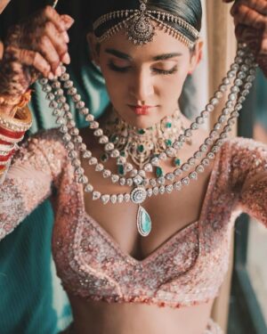 Mukti Mohan Instagram - This day is forever etched ♾️ 🤍🧿🌸

Eternally grateful, thank you for your blessings 🙏🏼

Captured by : @themadeinheaven 
Styled by : @shreyandurjastyle 
Outfit : @payalkeyalofficial 
Jewellery : @kishandasjewellery 
Kaleeras : @beabhika 
Make up : @ritickasjalan 
Hair : @aaliyahussainhairmakeupcreator

#KunalKoMiliMukti