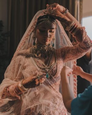 Mukti Mohan Instagram - This day is forever etched ♾️ 🤍🧿🌸

Eternally grateful, thank you for your blessings 🙏🏼

Captured by : @themadeinheaven 
Styled by : @shreyandurjastyle 
Outfit : @payalkeyalofficial 
Jewellery : @kishandasjewellery 
Kaleeras : @beabhika 
Make up : @ritickasjalan 
Hair : @aaliyahussainhairmakeupcreator

#KunalKoMiliMukti