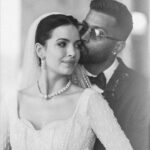 Natasa Stankovic Instagram - • Natasa ~•~ Hardik LOVE IN BLACK AND WHITE Life is full of surprises, and sometimes the best ones come when you least expect them. A chance encounter at a party and two strangers from different parts of the globe and even more different in culture and upbringing bump into each other and strike a bond. At the time no one thought their relationship would last beyond a few weeks but then love isn’t about where you come from or how you were raised. It’s about finding that person who completes you in every way. Unbashedly and unapologetically authentic to their nature of living life to the fullest, Natasa and Hardik survived the many ups and downs of life. Five years and a baby boy later they’re still having a blast as they renewed their vows amid friends and family in a scenic island in Udaipur. When you find the one you’re meant to be with, everything becomes crystal clear. There’s no room for doubt, no shades of grey. Love is black and white when you’re sure. Event planned by @shreem_events Hospitality by @eventswithwip Filmed at @rafflesudaipur Decor by @theweddingsquare_ Choreographed by @rianmistryproductions Styled by @nikitajaisinghani Wearing @abujanisandeepkhosla @shantanunikhil @manishmalhotraworld @pellesantino @farfetch @gretelz.milano Makeup by @bymaniasha Hair by @marcepedrozo Drape Artist @dolly.jain #hardikpandya #natasastankovic #theweddingstory #twsindia #twscouple #sonyalphain #createwithsony Raffles Udaipur
