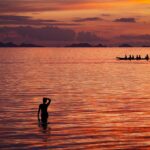 Nidhi Bhanushali Instagram - Dipping into golden waters under the painted sky. #SunsetSwimMagic Koh Phangan เกาะพะง้น