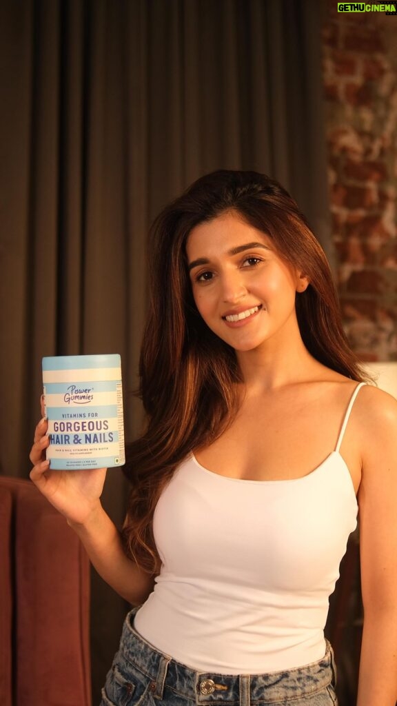 Nidhi Shah Instagram - Unveiling the power of scientific care & luscious locks with Power Gummies hair & nail vitamins. Nurturing your inner beauty has been made easier with scientifically proven ingredients like Biotin with carefully curated formula by adding 10 essential vitamins for strong, shiny and beautiful hair. These gummies has been proven with clinical research which comes with everyday promise of: - Reduced hair fall - Faster hair growth - Improved hair texture Stay confident everywhere! Win with a smile & say goodbye to dull moments of life and hello to a world of Gorgeous YOU! 🌸 Shop now at powergummies.com #PowerGummies #Biotin #GlowingFromWithin #PowerGummiesMagic #InnerBeautyJourney #ShineBrightLikeYourHair #NourishFromWithin #ConfidenceInEveryGummy #HealthyHairHappyLife #hairgrowthmatlabpowergummies #90daystogorgeoushair