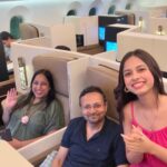 Nitanshi Goel Instagram - "Celebrating my parents' first-ever business class flight with a grateful heart!♥️✨ Last time, I felt a bit sad to see my parents in the economy class while I was in luxury! But that only fueled my desire to work harder and make their dreams come true. They have always worked hard to fulfill mine, and now it's my turn to do the same for them! Here's to many more comfortable journeys together ✈️ Love you @nitingoeljii daddy😘 @rashigoelofficial mumma😘 Also Spot one of my fav actor in 5th pic♥️ #IIFAONYAS #iifa2023 #iifa #iifrocks #FamilyLove #BusinessClassDreams #nitingoel #rashigoel #nitanshigoel Etihad Airways Business Class