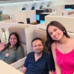 Nitanshi Goel Instagram - "Celebrating my parents' first-ever business class flight with a grateful heart!♥️✨ Last time, I felt a bit sad to see my parents in the economy class while I was in luxury! But that only fueled my desire to work harder and make their dreams come true. They have always worked hard to fulfill mine, and now it's my turn to do the same for them! Here's to many more comfortable journeys together ✈️ Love you @nitingoeljii daddy😘 @rashigoelofficial mumma😘 Also Spot one of my fav actor in 5th pic♥️ #IIFAONYAS #iifa2023 #iifa #iifrocks #FamilyLove #BusinessClassDreams #nitingoel #rashigoel #nitanshigoel Etihad Airways Business Class