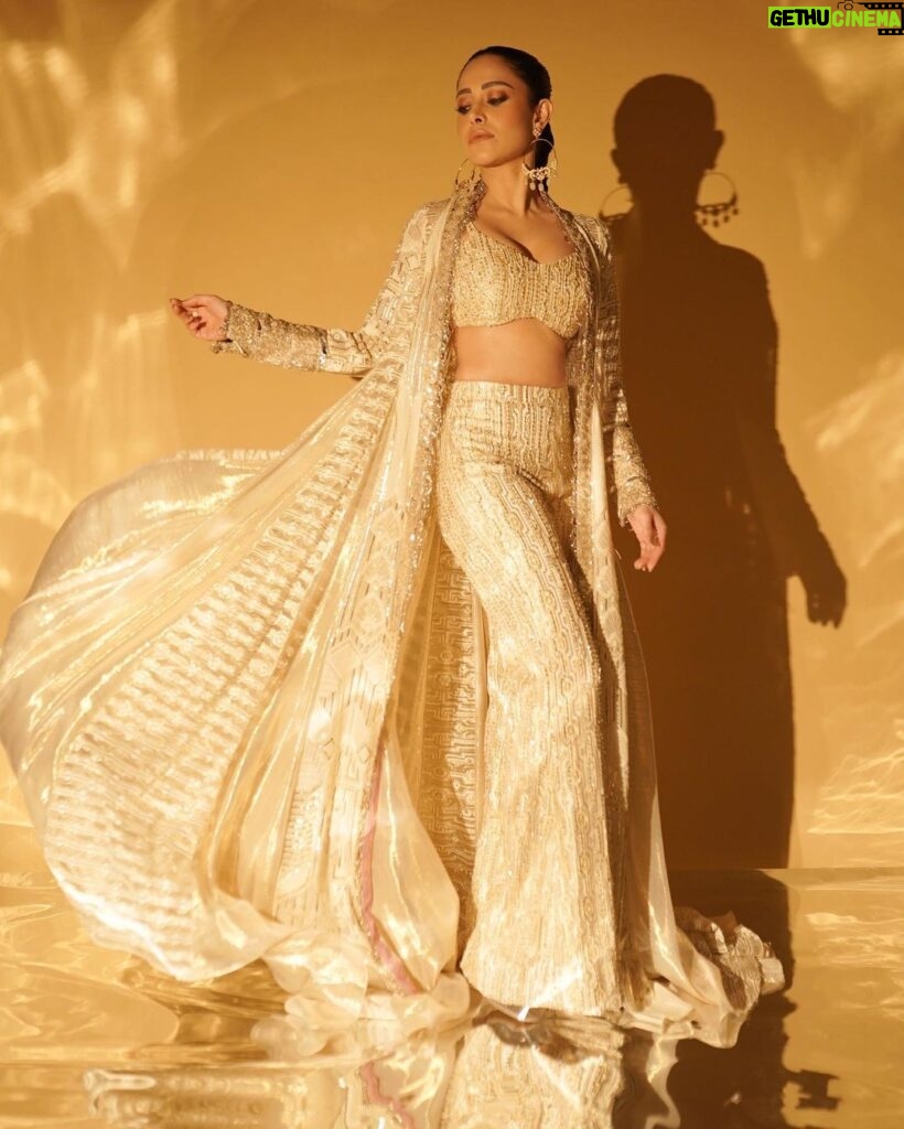 Nushrratt Bharuccha Instagram - The Golden Hour is here! ✨✨ It’s MM’s Diwali Night!! Outfit @manishmalhotraworld HMU @vardannayak @cheemabaljit2 Styled by @nidhijeswani Earrings @uncut_byaditiamin Ring @shoppaksha 📸 @miteshsphotography