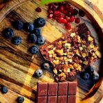 Onima Kashyap Instagram - Making chocolate is a way of life 😋 Homemade organic dark chocolate #sugarfree #madewithlove ❤ @onima_creations *coconibs *coconut oil *orange zest *jaggery *cranberries *walnuts *almond *raisins *n love #organicchocolates #darkchocolate #homemadechocolates #homemadefood #organicfood #homemadecooking #recipes #deserts #sweets #veganrecipes #veganfood