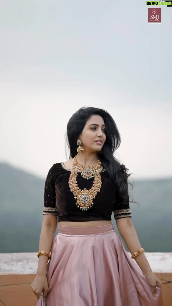 Pavani Reddy Instagram - She is beauty, she is grace. Every movement, every step she sways, Embellished and enchanted, in an elegant embrace. SMJ X Pavni Watch as our exquisite ornaments adorn our very own @pavani9_reddy. Senthil Murugan Jewellers stands tall as Madurai’s Golden Empire, with a 60 year legacy of timeless elegance and impeccable craftsmanship. Every jewel and every glimmer tells a tale of its own, each piece an embodiment of artistry and sophistication. Dedicated to serving the people, we offer nothing but good luck and fortune along with exclusive designs. Visit @senthilmuruganjewellers and enter the realm of golden charm and magic. Contact now at 8110023305 / 9486258161. #SenthilMuruganJewellers #SMJ #Jewellery #GoldJewellery #TraditionalJewelery #GoldNecklaces #IndianJewellery #Madurai #Jewels