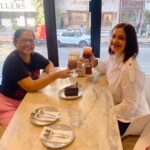 Pooja Bhatt Instagram - Celebrating 25 yrs of #Dushman with the powerhouse @tanuja__chandra I do hope with my entire being that life gives us the privilege of being back on set together. Not only with me producing your film but also someday with you directing me. Gracias @earthcafeindia for being so welcoming and sending over that delicious gluten free cake! ♥️ #womenincinema #dushman #tanujachandra #writer #director #womanaftermyownheart