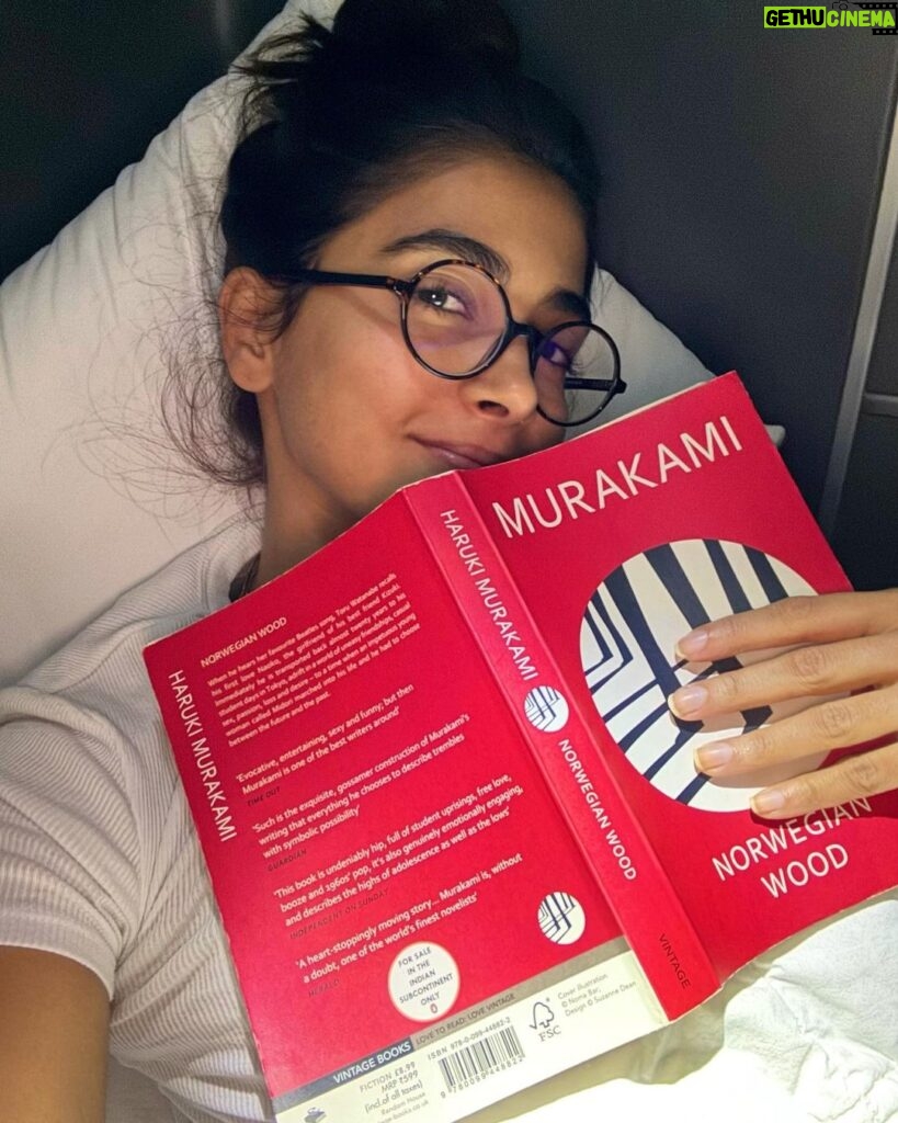 Pooja Hegde Instagram - Murakami, you make me cry.. you brilliant, twisted, beautiful, soul provoking GENIUS 🥺❤️ #transitreading ✈️ #inflightentertainment #loveiseverything 🫶🏼
