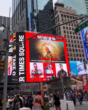 Pranjal Dahiya Instagram - Good morning everyone! Sharing our Times Square NYC city takeover!👯‍♀️

This is to celebrate you all who have been creating and supporting Haryanvi HipHop scene since day 1. Haryanvi HipHop is on the rise quite literally, artists are setting milestones, creators are supporting it and taking it to new audiences.
We ourselves have set a record since *Kaleshi Chori* became the first ever haryanvi song to cross 50M streams on Spotify.🔥🧿 
.
@dgimmortal @officialraga @harjasharjaayi @virtual_af @darkhorse @deepesh.dg @corrupt_tuber @elvish_yadav @vyrlharyanvi 
.
.
#pranjaldahiya #newyorkcity