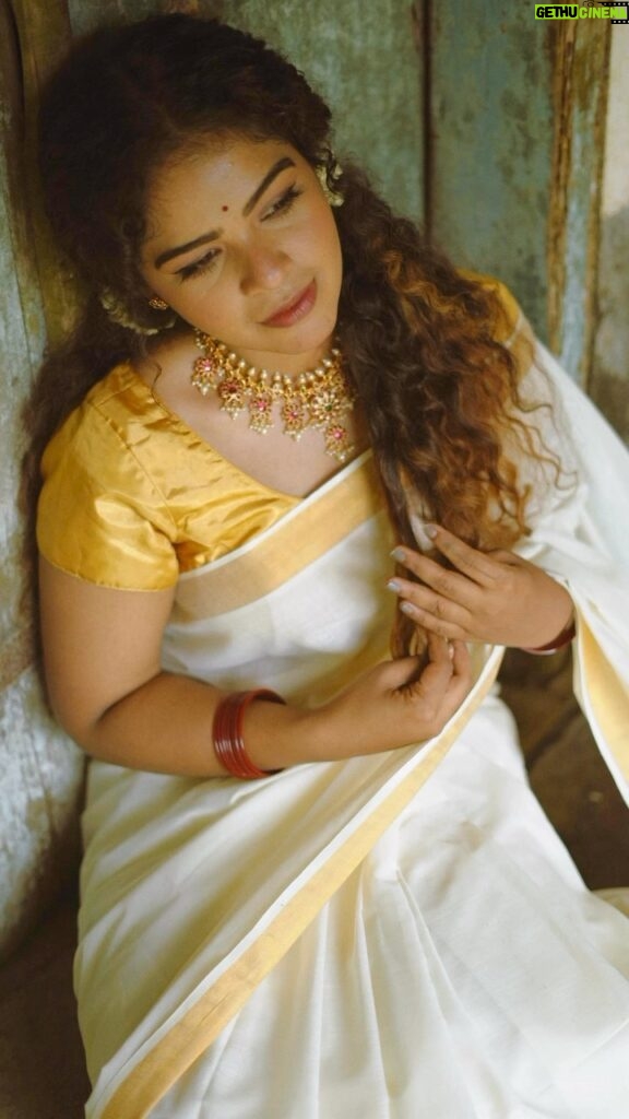 Priya Jerson Instagram - Exquisite blend of tradition and artistry – Adorning the elegance of a Kerala Kasavu saree with a mesmerizing pichwai print. Muse @priya.jerson Camera @chitrapriyadarshini MUA @m.m_by_madonna #saree #sareefashion #sareelover #sareeindia #sareeindia #sareecollection #kasavu #kasavusaree #onam #onamsaree #onamcelebration #keralagallery #keralatourism #keralagodsowncountry #onamoutfit