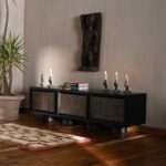 Rhea Kapoor Instagram - Available in Walnut and Black. Artfully designed for both function and style, the Sake Cabinet and Saga Media Unit are crafted from a hardwood frame with textured brass grille shutters. Also seen here: Hand of Adam Figurines @ashieshshahatelier Wall Sculpture @ganeshemporium Shop now @thehouseofthings. Photograph: @talib_chitalwala Styling: @sam_wade11 Design & Production: @thehouseofthings #thehouseofthings #rheakapoor #ravivazirani #beautifulrareinspired #THOTxRheaKapoor #interiordesign #homedecor #collaboration #chicstorage Mumbai, Maharashtra