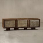 Rhea Kapoor Instagram - Available in Walnut and Black. Artfully designed for both function and style, the Sake Cabinet and Saga Media Unit are crafted from a hardwood frame with textured brass grille shutters. Also seen here: Hand of Adam Figurines @ashieshshahatelier Wall Sculpture @ganeshemporium Shop now @thehouseofthings. Photograph: @talib_chitalwala Styling: @sam_wade11 Design & Production: @thehouseofthings #thehouseofthings #rheakapoor #ravivazirani #beautifulrareinspired #THOTxRheaKapoor #interiordesign #homedecor #collaboration #chicstorage Mumbai, Maharashtra