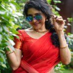 Sakshi Agarwal Instagram – Sari, glasses, and a dash of red – seeing the world through a stylish lens. 👓❤️ #SareeSwag #SpecsAndStyle
.
Btw- kudos to the team- these are raw images😍
.
Photography : @en.nizharpadam 
Make up : @murugeshmakeup_hair 
Hair : @elegant_bridalstudio 
Outfit : @shri_she 
Jewellery : @chennai_jazz 
Location : @Praku1989 @ecrbeach Chennai, India