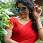 Sakshi Agarwal Instagram – Sari, glasses, and a dash of red – seeing the world through a stylish lens. 👓❤️ #SareeSwag #SpecsAndStyle
.
Btw- kudos to the team- these are raw images😍
.
Photography : @en.nizharpadam 
Make up : @murugeshmakeup_hair 
Hair : @elegant_bridalstudio 
Outfit : @shri_she 
Jewellery : @chennai_jazz 
Location : @Praku1989 @ecrbeach Chennai, India
