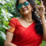 Sakshi Agarwal Instagram – Sari, glasses, and a dash of red – seeing the world through a stylish lens. 👓❤️ #SareeSwag #SpecsAndStyle
.
Btw- kudos to the team- these are raw images😍
.
Photography : @en.nizharpadam 
Make up : @murugeshmakeup_hair 
Hair : @elegant_bridalstudio 
Outfit : @shri_she 
Jewellery : @chennai_jazz 
Location : @Praku1989 @ecrbeach Chennai, India
