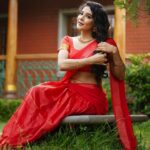 Sakshi Agarwal Instagram – “Draped in passion, vibin’ in red hues – because every moment deserves a touch of elegance. ❤️👗 #RedSareeMagic #EleganceInEveryFold”
.

Photography : @en.nizharpadam 
Make up : @murugeshmakeup_hair 
Hair : @elegant_bridalstudio 
Outfit : @shri_she 
Jewellery : @chennai_jazz 
Location : @Praku1989 @ecrbeach ECR Resorts