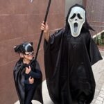 Sameera Reddy Instagram - Halloween Fun with the kids🎃 Hans in full character as Ghostface from Scream & Nyra as Cat woman 🐈‍⬛❤️ lovin all the costumes 👻 #halloween #halloweencostume #spooky #fun