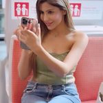 Sana Sultan Instagram - What is “the one who will get u vl b lucky” rather it should b this☝🏻🥰 P.s : A Quick Fun fact, this orginal song was also shot in sydney Metro Train (so tried to recreate the video but in Sana Sultaan Version) 🥰✨🫰🏻