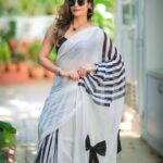 Shrutika Instagram - My most favourite three in our latest collection "moodswings " @thariibyshrutika www.thariibyshrutika.com (link in bio) The b/w embroidered pretty bow saree called "Dramaqueen" The 7 wonders of the world on our bright lemon yellow mulmul cotton called "whimsy wonder" And the striking black n orange saree called "rollercoaster" Are my personal favorites !! We try and bring out speciall designs for the special you ,that u cannot find elsewhere! Because u are unique ; the designs for u should b unique! Personally designed by me @shrutika_arjun for u with lots of ❤️ #saree #fashion #love #designs #festivecollection #instafashion