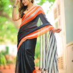 Shrutika Instagram - My most favourite three in our latest collection "moodswings " @thariibyshrutika www.thariibyshrutika.com (link in bio) The b/w embroidered pretty bow saree called "Dramaqueen" The 7 wonders of the world on our bright lemon yellow mulmul cotton called "whimsy wonder" And the striking black n orange saree called "rollercoaster" Are my personal favorites !! We try and bring out speciall designs for the special you ,that u cannot find elsewhere! Because u are unique ; the designs for u should b unique! Personally designed by me @shrutika_arjun for u with lots of ❤️ #saree #fashion #love #designs #festivecollection #instafashion