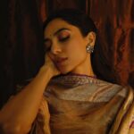 Sobhita Dhulipala Instagram - Attended the spectacular jio MaMi opening ceremony last night. Even presented an award! I was on the jury for short films this year. Also Manish Malhotra gilded me in gold like this. Met so many actor friends! Ate samosa. Drank Coca Cola with a straw. Whistled. Took lots of pictures and came home to my parents who muted the TV and asked me all about who I met and what I said on stage and if I tripped again.
