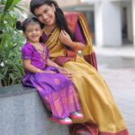 Sridevi Ashok Instagram - When God overheard us say “that @sitara_chintala was not that hard and we could handle another,” God uttered “challenge accepted!” Sitara dress : @kid.sbucket My saree : @lfab_creations
