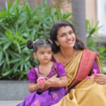 Sridevi Ashok Instagram - When God overheard us say “that @sitara_chintala was not that hard and we could handle another,” God uttered “challenge accepted!” Sitara dress : @kid.sbucket My saree : @lfab_creations