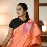 Surabhi Lakshmi Instagram - "Basking in the elegance of sunshine hues, draped in a saree that whispers timeless grace ✨ Stylist: @rashmimuraleedharan Hair&makeup: @amal_ajithkumar Saree: @roukabysreejithjeevan Photography: @akhil_photography_tvm #SareeElegance #SunshineSaree #orangesaree