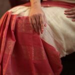 Swastika Mukherjee Instagram - May we always find the joy of wearing our mother’s sarees in ways we like. @swastikamukherjee13 in her Mother’s Tant recreated by us on handloom. Golden zari woven in geometric and florals all over the upper half and red with horizontal zari patterns on the lower. Half Half sarees were extremely popular then and now. This one is a shade of white and gold with dudhey aalta. Subtle, beautiful. Paired with a red checkered blouse with a beautiful Chettinad border. Styled by @rishabhad Managed by @lipstickler Photography: @upaharbiswas Make up: @prosenjit4867 Hair : @mallicknita.bigbi Thank you @ranit.maiti for the space. Kolkata