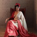 Swastika Mukherjee Instagram - May we always find the joy of wearing our mother’s sarees in ways we like. @swastikamukherjee13 in her Mother’s Tant recreated by us on handloom. Golden zari woven in geometric and florals all over the upper half and red with horizontal zari patterns on the lower. Half Half sarees were extremely popular then and now. This one is a shade of white and gold with dudhey aalta. Subtle, beautiful. Paired with a red checkered blouse with a beautiful Chettinad border. Styled by @rishabhad Managed by @lipstickler Photography: @upaharbiswas Make up: @prosenjit4867 Hair : @mallicknita.bigbi Thank you @ranit.maiti for the space. Kolkata